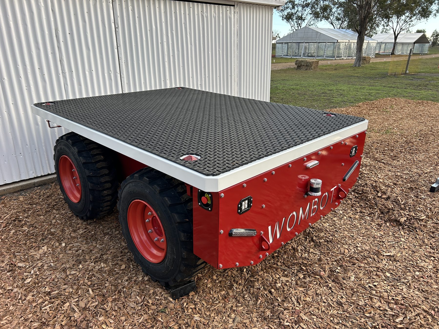 Wombot prototype shown from the front on a workshop driveway